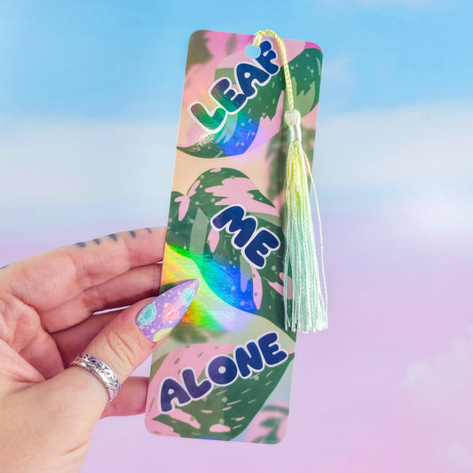 Leaf Me Alone holographic bookmark with tassel – pink princess philodendron leaf design, funny pun gift for book lovers