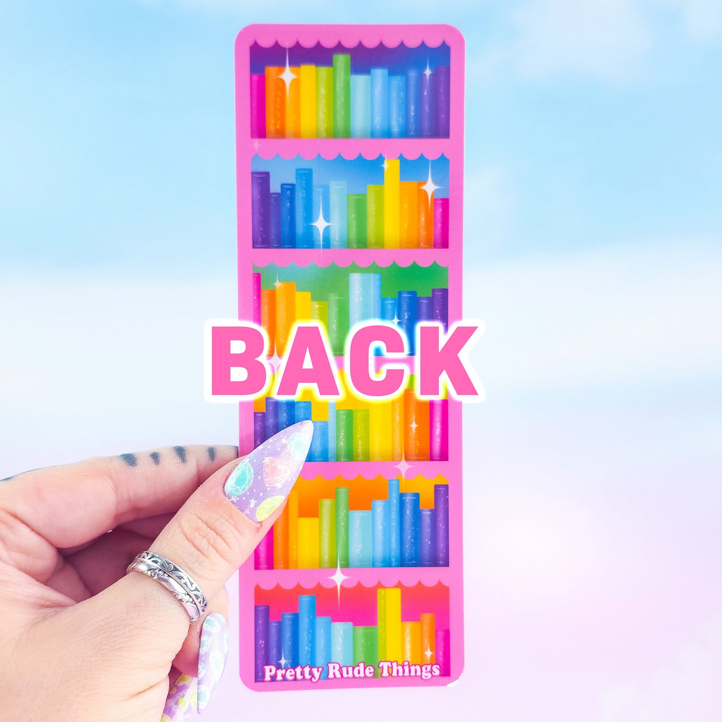 Back of pink bookcase holographic bookmark – rainbow bookshelf design, laminated handmade by Pretty Rude Things