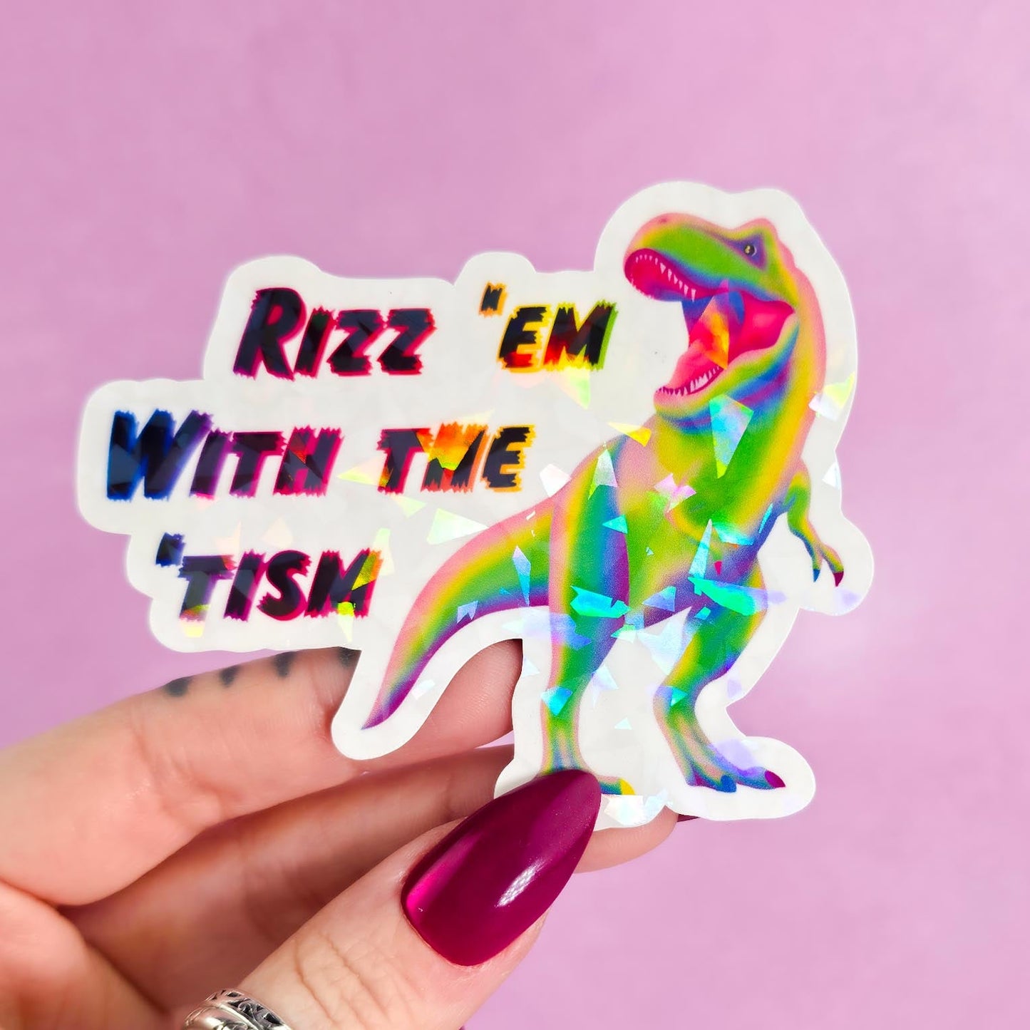 Rizz ‘em with the ‘Tism T-Rex Sticker