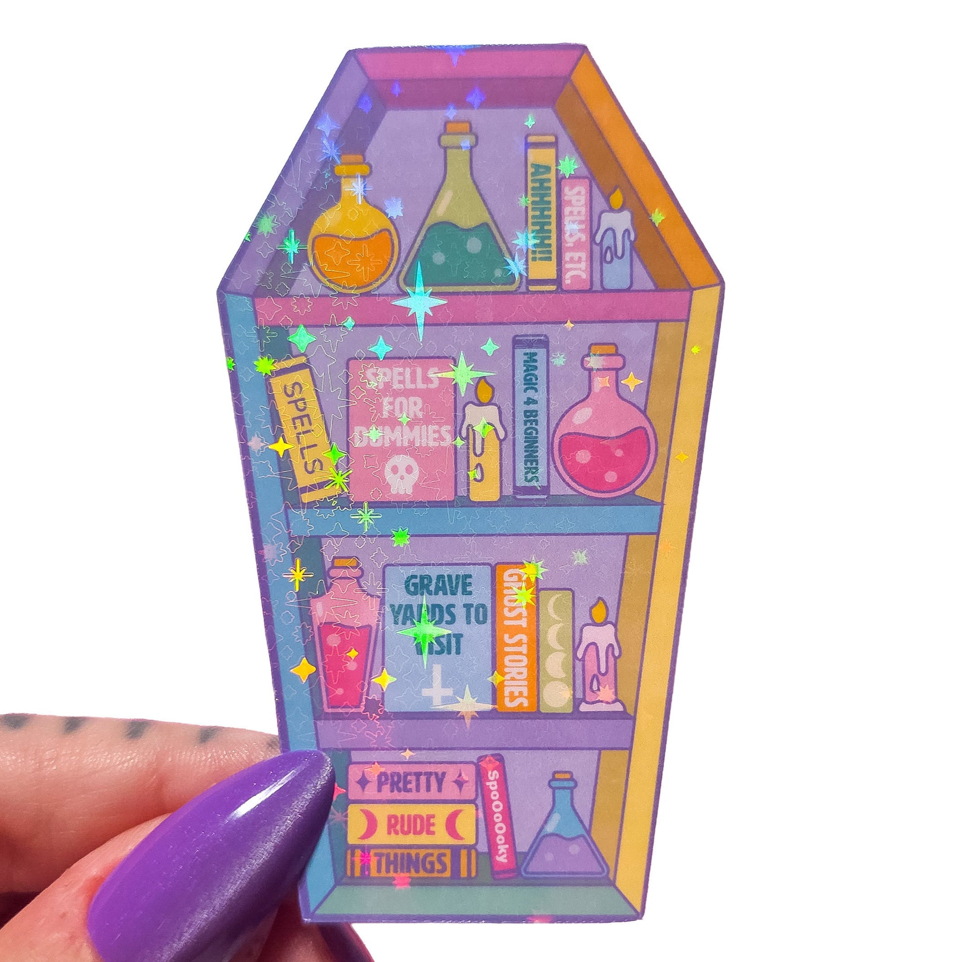 Colorful coffin-shaped sticker with potion bottles and books on a white background