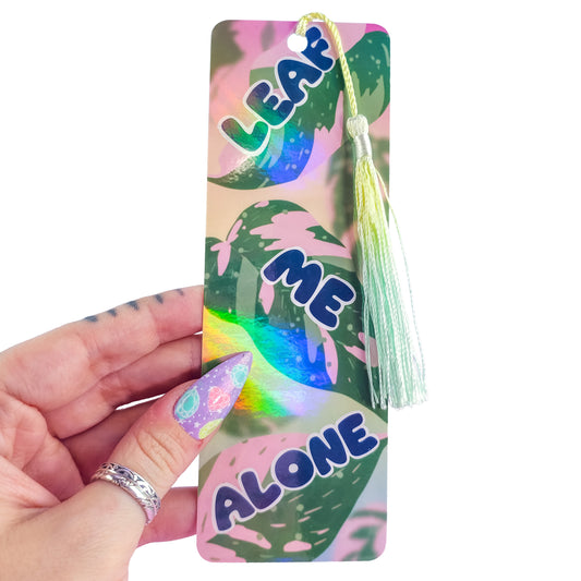 Leaf Me Alone holographic bookmark with tassel – pink princess philodendron leaf design, funny pun gift for book lovers