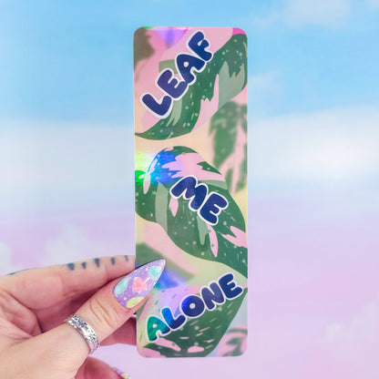 Leaf Me Alone holographic bookmark – glossy laminated pink princess philodendron leaf design, handmade punny book accessory