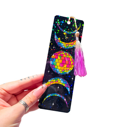 Rainbow disco ball moon holographic bookmark with tassel on a white background
